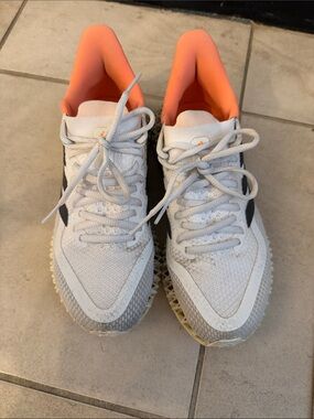 adidas Women’s White Sneakers with Orange Collar and Black Three Stripes